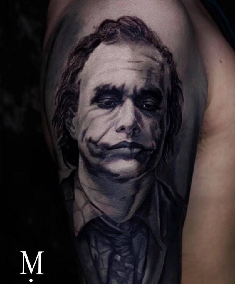 joker纹身图片_手臂欧美写实小丑纹身图案