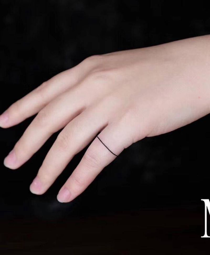 指环纹身图片_手部水墨指环纹身图案