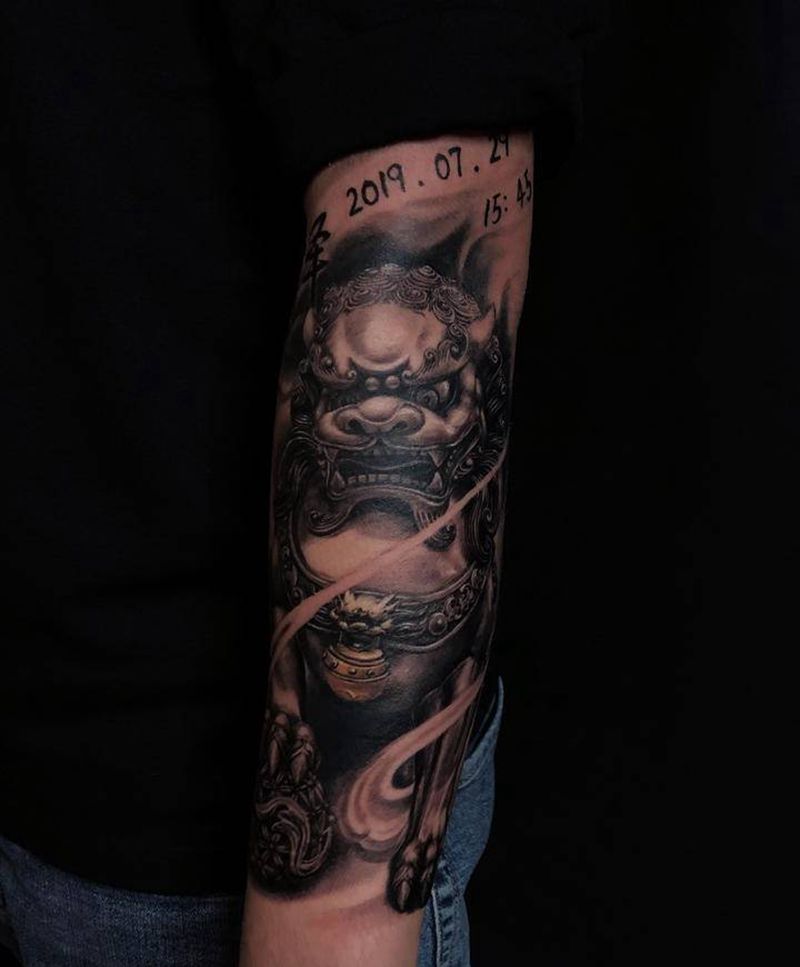 唐狮子纹身图片_唐狮子纹身图案