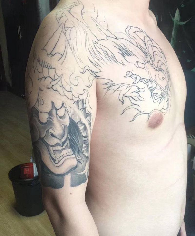 传统。扎实纹身图片_手臂新传统纹身图案