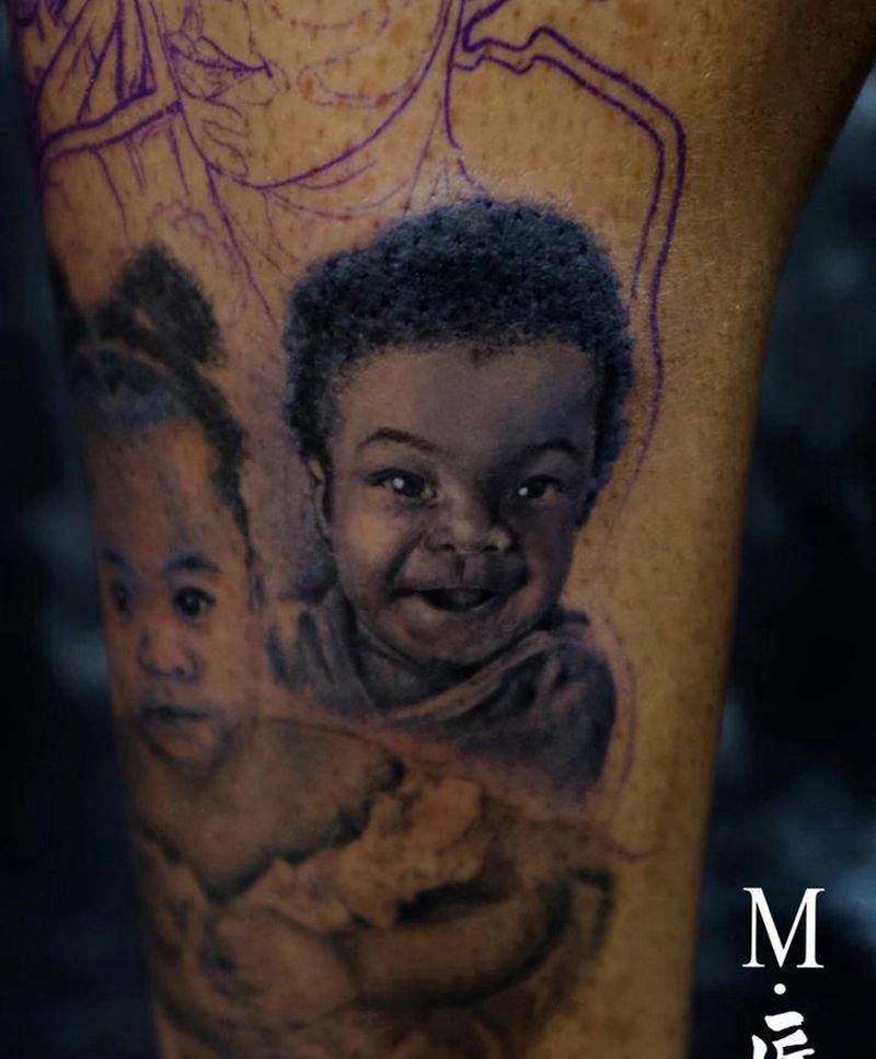 人物肖像纹身纹身图片_腿部欧美写实人物肖像写实纹身图案