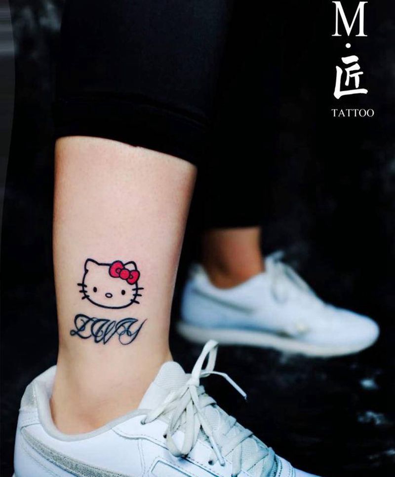 纹身作品分享纹身图片_腿部几何水彩hello kitty凯蒂猫动物纹身图案