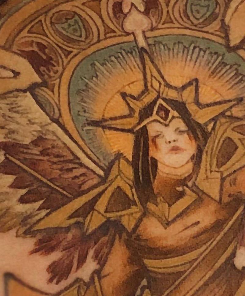 凯尔纹身图片_背部新传统New School天使纹身图案