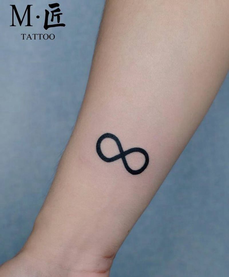 符号纹身纹身图片_手臂图腾几何♾️线条小清新纹身图案