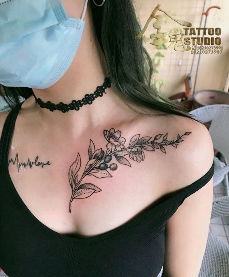 素花纹身图片_胸部纹身图案