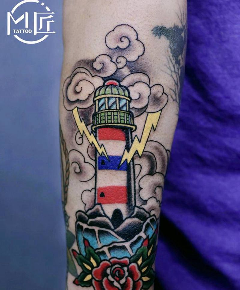 风暴中的灯塔纹身图片_手臂Old School灯塔纹身图案