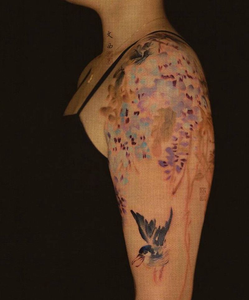 低枝拂潭纹身图片_手臂新传统水墨传统花鸟纹身图案