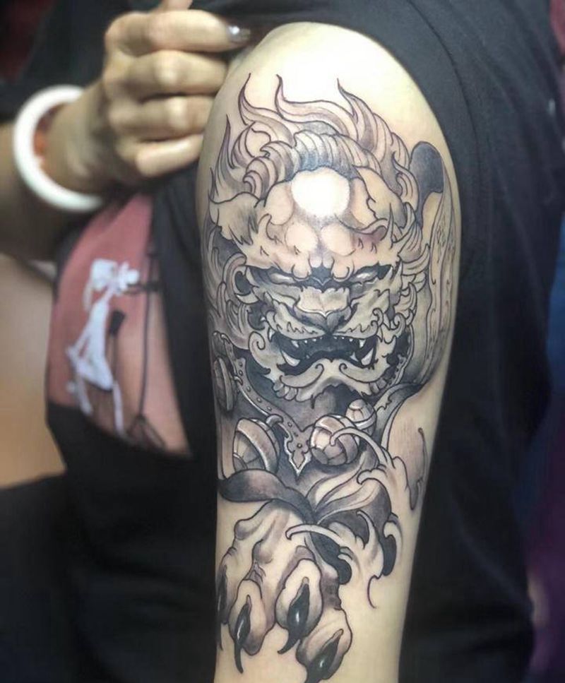 小狮子纹身图片_手臂新传统纹身图案