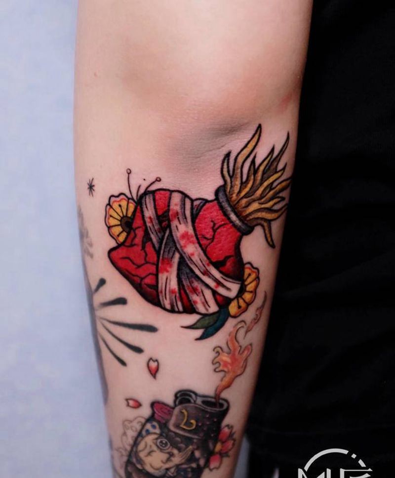 破碎心脏纹身图片_手臂纹身图案