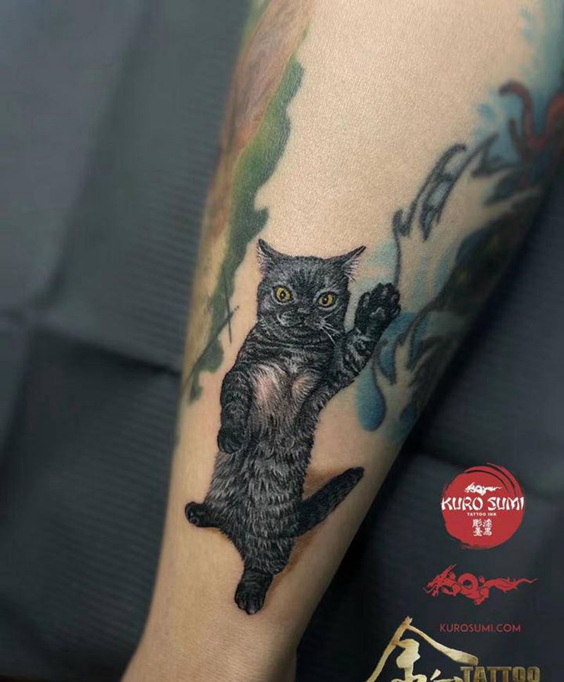 喵纹身图片_腿部纹身图案