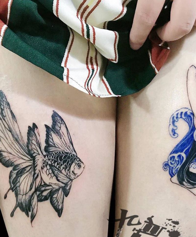遮盖纹身纹身图片_腿部点刺水彩鱼女孩纹身图案