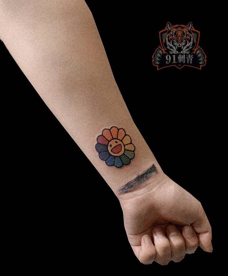 笑脸纹身图片_手臂笑脸纹身图案