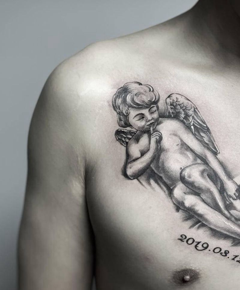 天使宝宝纹身图片_胸部欧美写实点刺纹身图案