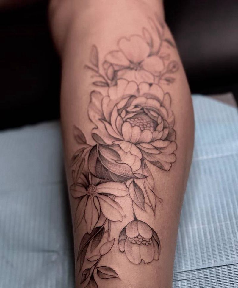 素花纹身图片_腿部纹身图案