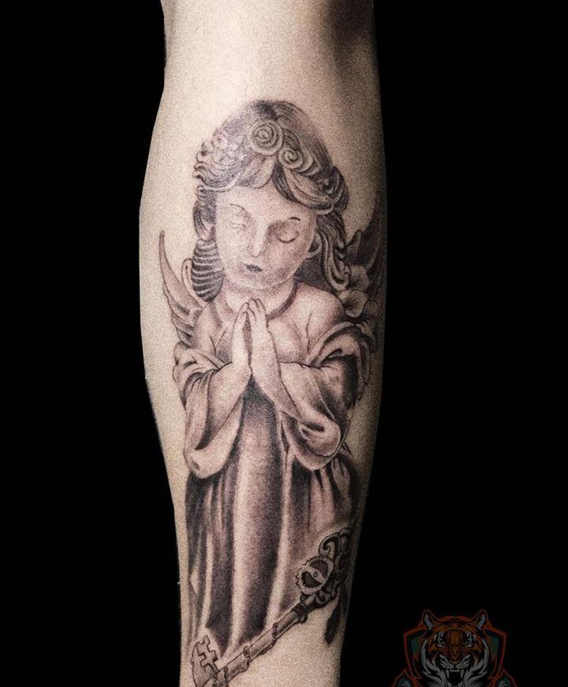 天使纹身图片_手臂欧美写实天使钥匙纹身图案