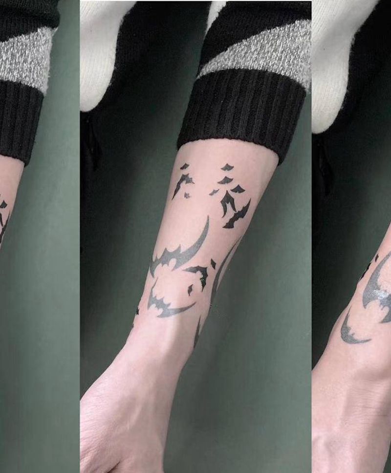 蝙蝠纹身图片_手臂图腾蝙蝠纹身图案