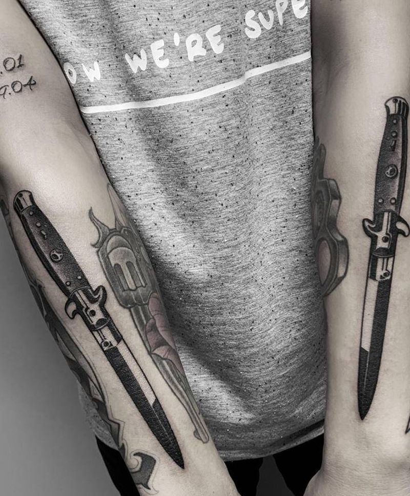 跳刀纹身图片_手臂图腾欧美写实匕首纹身跳刀纹身刀纹身纹身图案