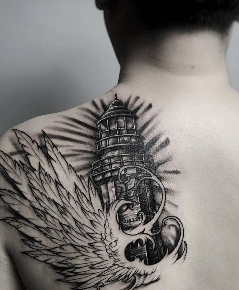 自由的方向纹身图片_肩部背部欧美写实点刺翅膀纹身欧美纹身灯塔纹身纹身图案