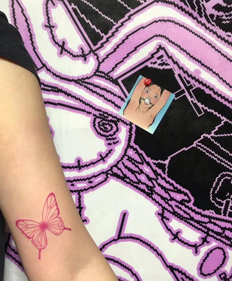 蝴蝶纹身图片_手臂水彩纹身图案