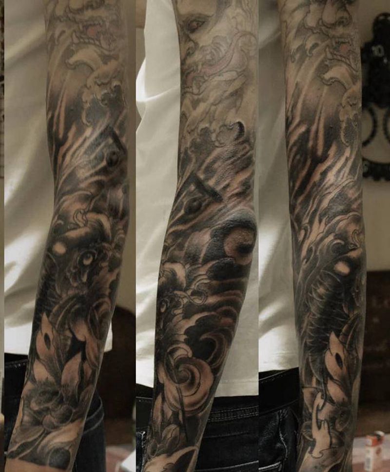 鲤鱼接花臂纹身图片_手臂老传统鲤鱼纹身图案