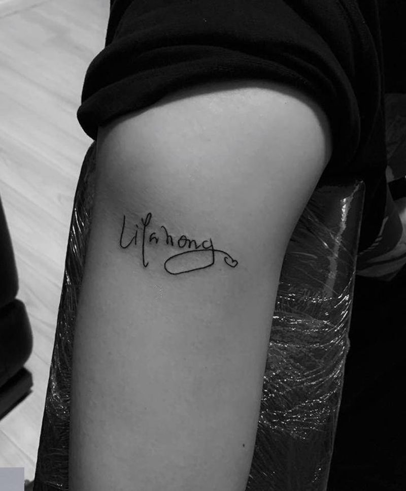 字母纹身图片_手臂花体字纹身图案