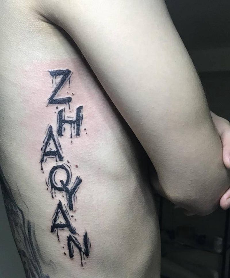 字母纹身图片_腰部图腾字母纹身图案