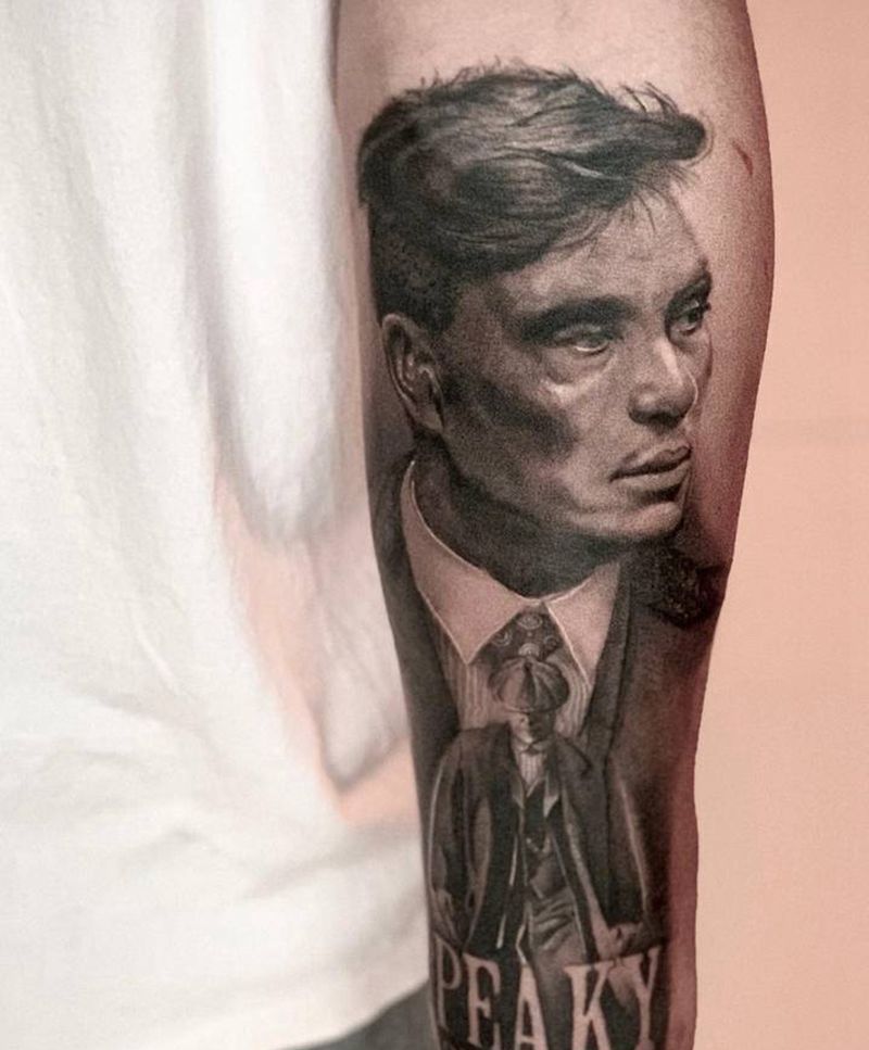 一刺-闰土纹身图片_欧美写实纹身图案