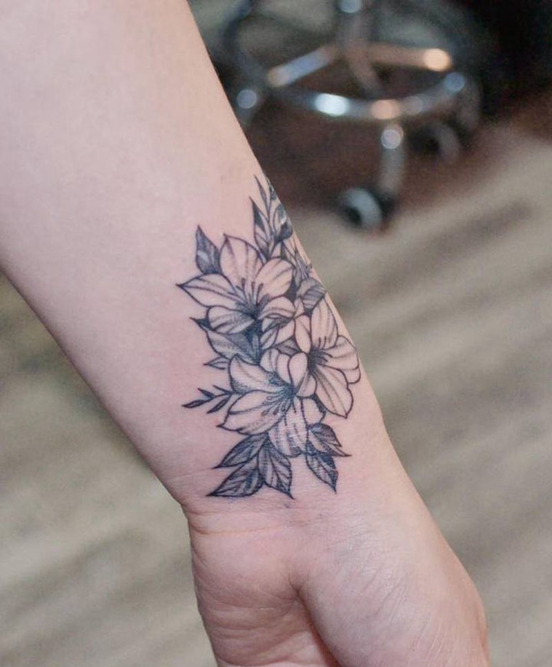 素花纹身图片_手臂欧美写实纹身图案