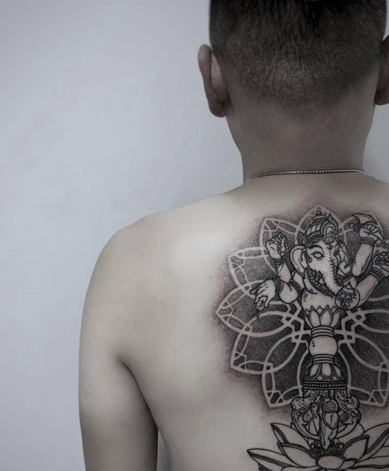 四臂象神纹身图片_背部新传统点刺象神金刚杵降魔杵纹身图案