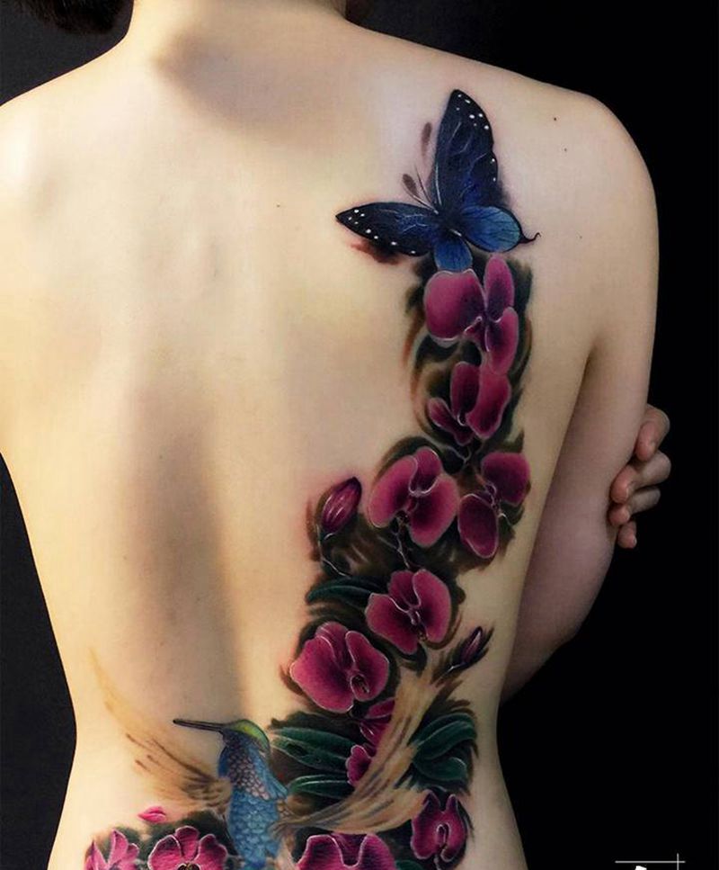 蝴蝶兰纹身图片_背部欧美写实水彩花欧美写实欧美彩色纹身图案