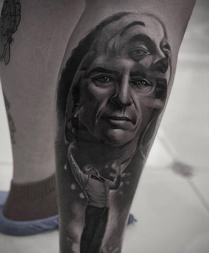 一刺-闰土纹身图片_腿部欧美写实纹身图案