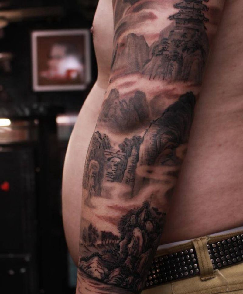 整臂局部纹身图片_手臂手部新传统水墨山水纹身图案