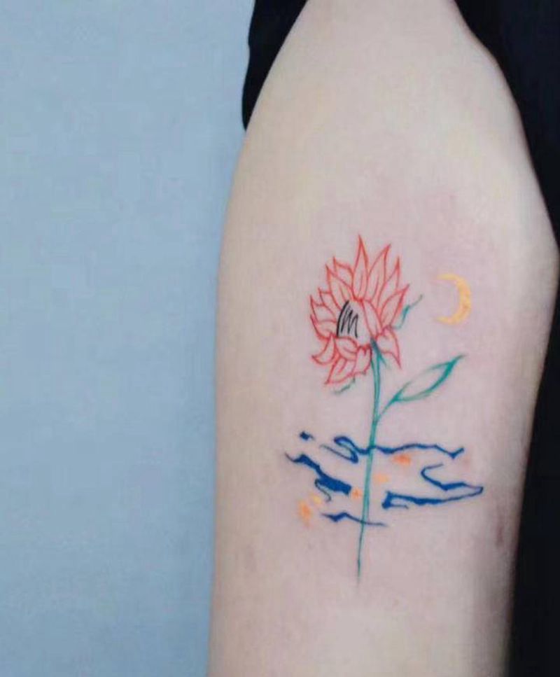 花纹身图片_手臂水彩纹身图案