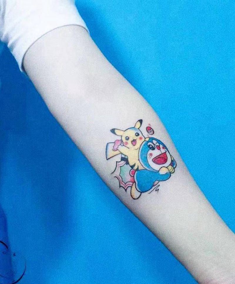 多啦爱梦纹身图片_手臂水彩纹身图案