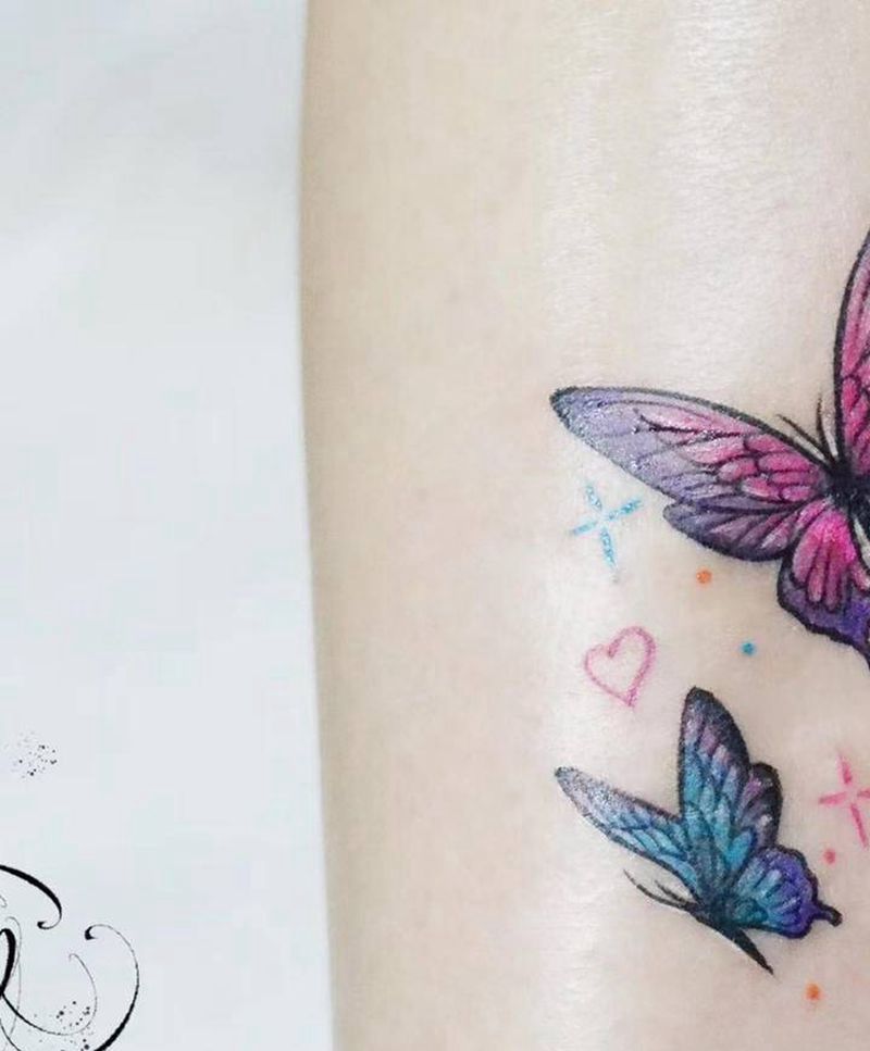 蝴蝶纹身图片_腿部水彩纹身图案