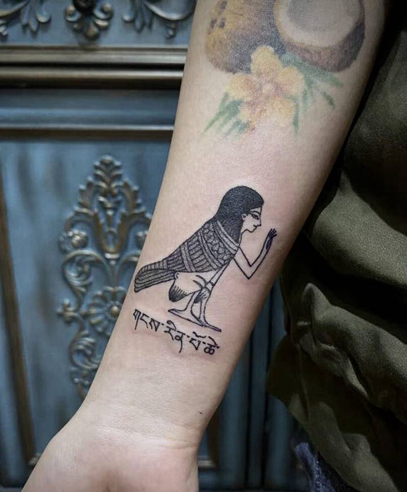 鸟人纹身图片_手臂纹身图案