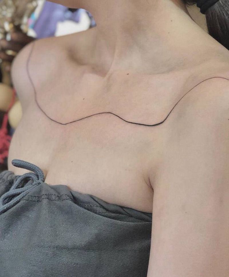 线纹身图片_胸部手臂纹身图案