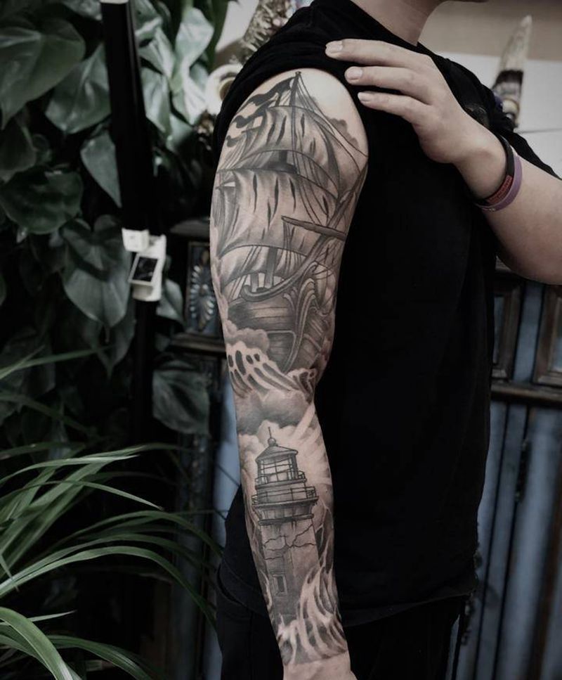 帆船灯塔纹身图片_手臂纹身图案