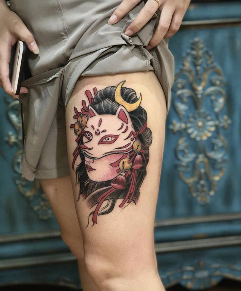 面具美女纹身图片_腿部纹身图案