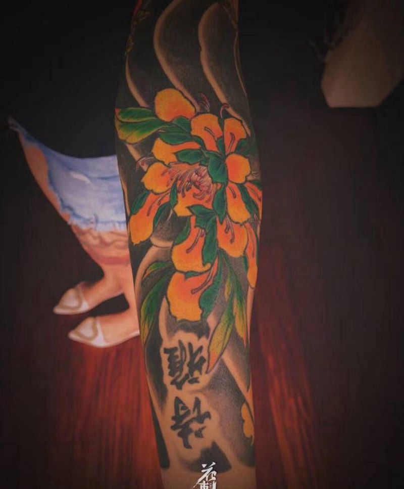 接花臂纹身图片_手臂纹身图案