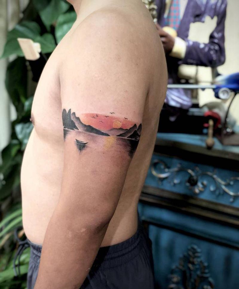 夕阳纹身图片_手臂纹身图案