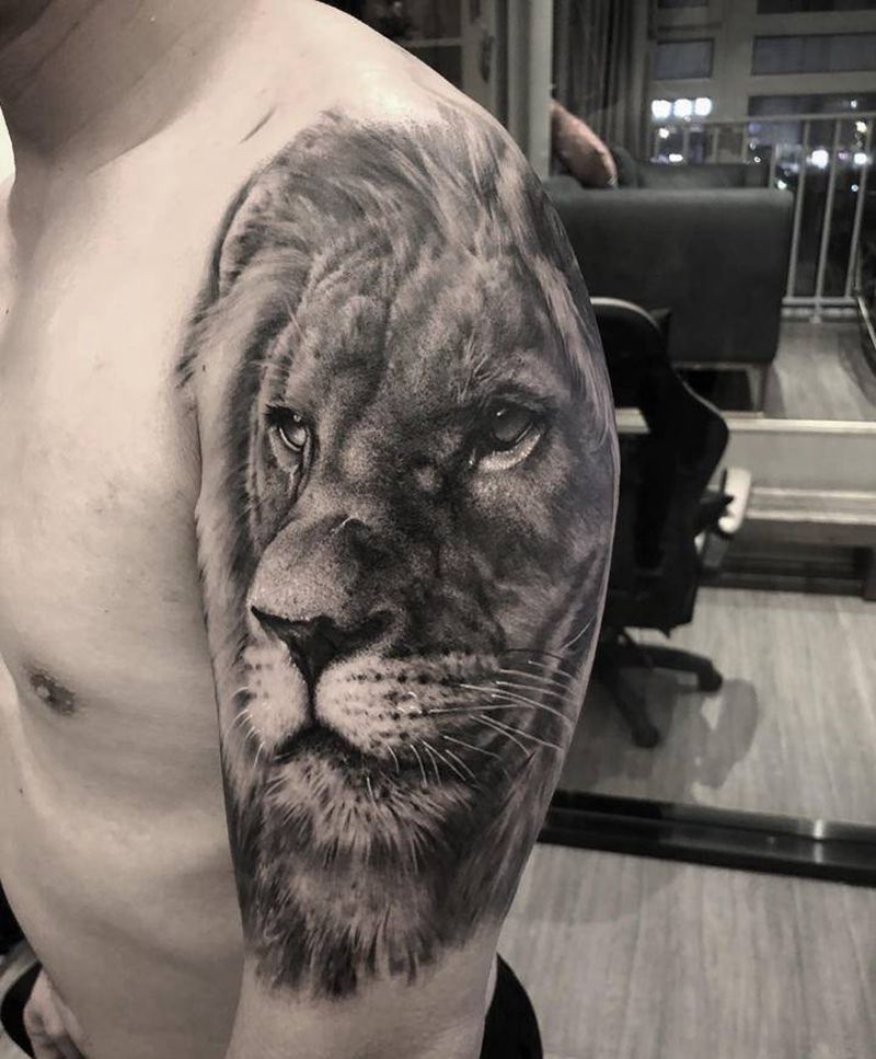 狮子纹身图片_手臂欧美写实纹身图案