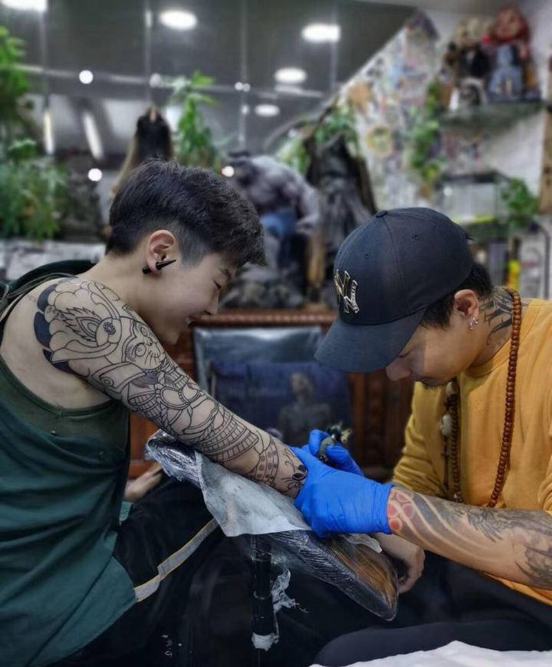 花臂纹身图片_手臂老传统纹身图案