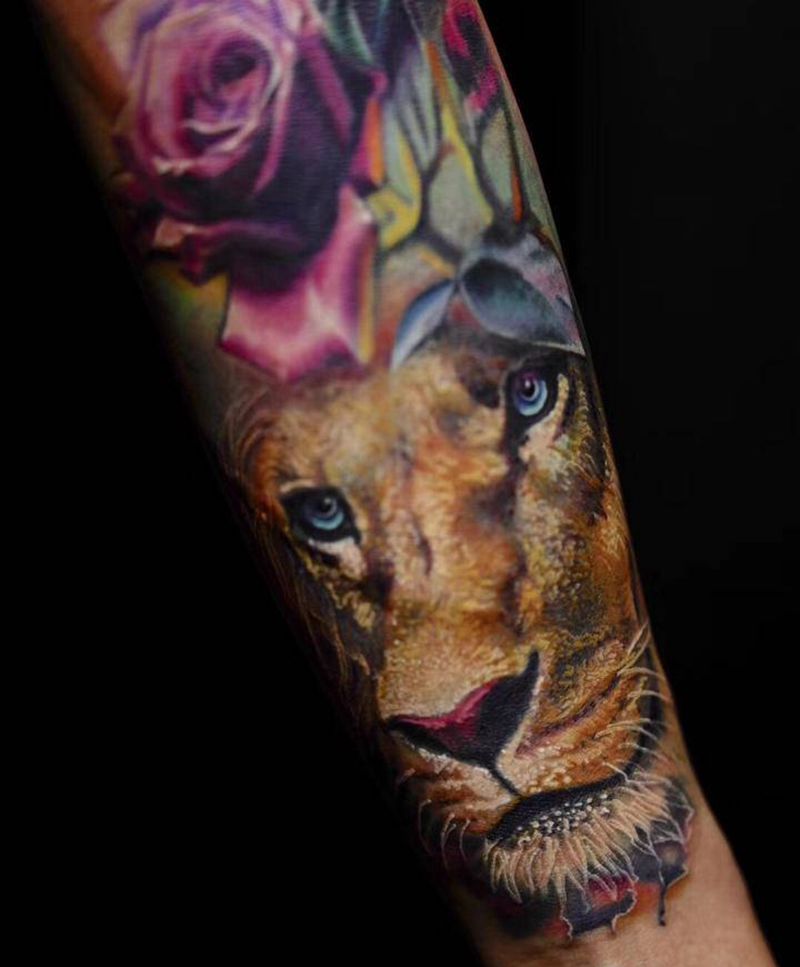 狮子纹身图片_手臂欧美写实狮子纹身图案