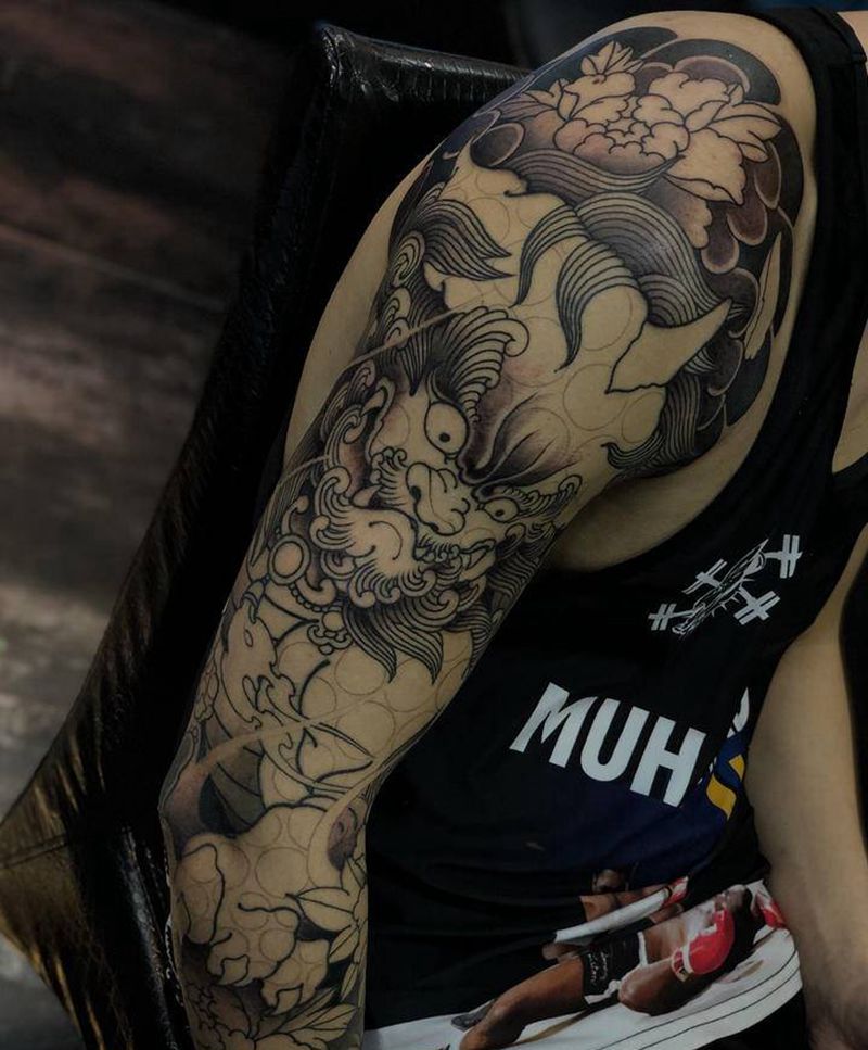 七分袖,未完待,唐狮纹身图片_手臂新传统纹身图案