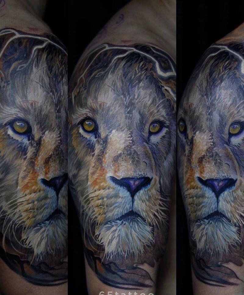 狮子纹身图片_手臂欧美写实纹身图案