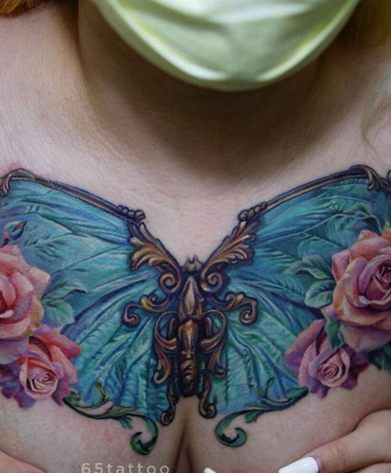 花胸纹身图片_胸部欧美写实纹身图案