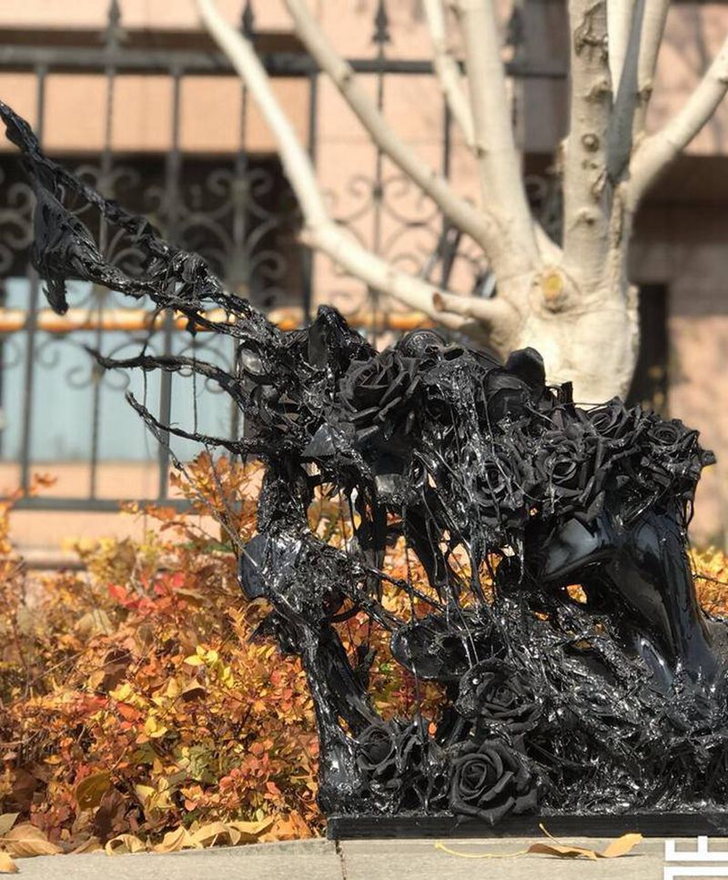 爱之殇纹身图片_装置雕塑纹身图案