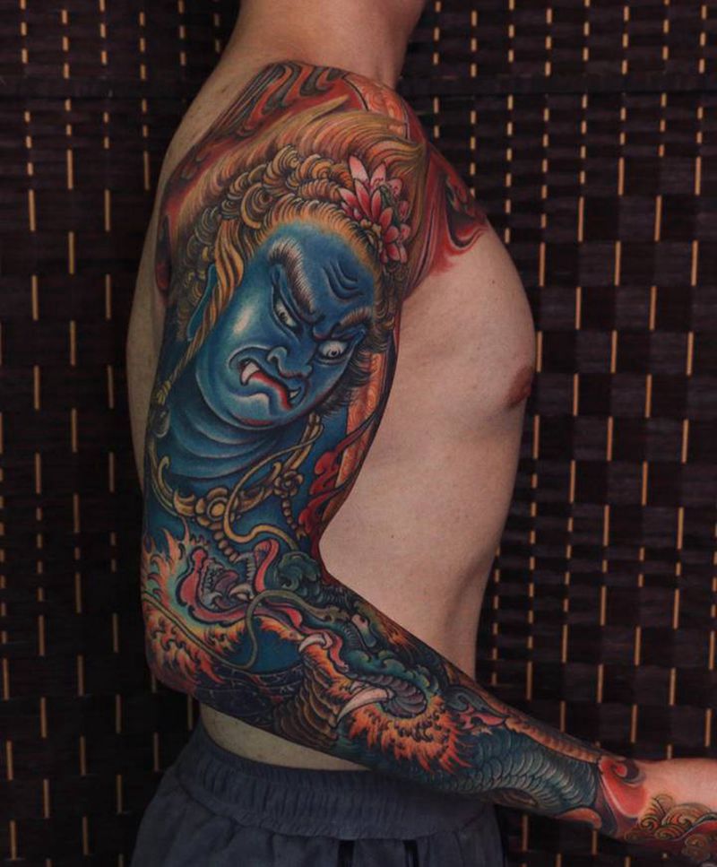 重彩不动明王纹身图片_手臂新传统纹身图案