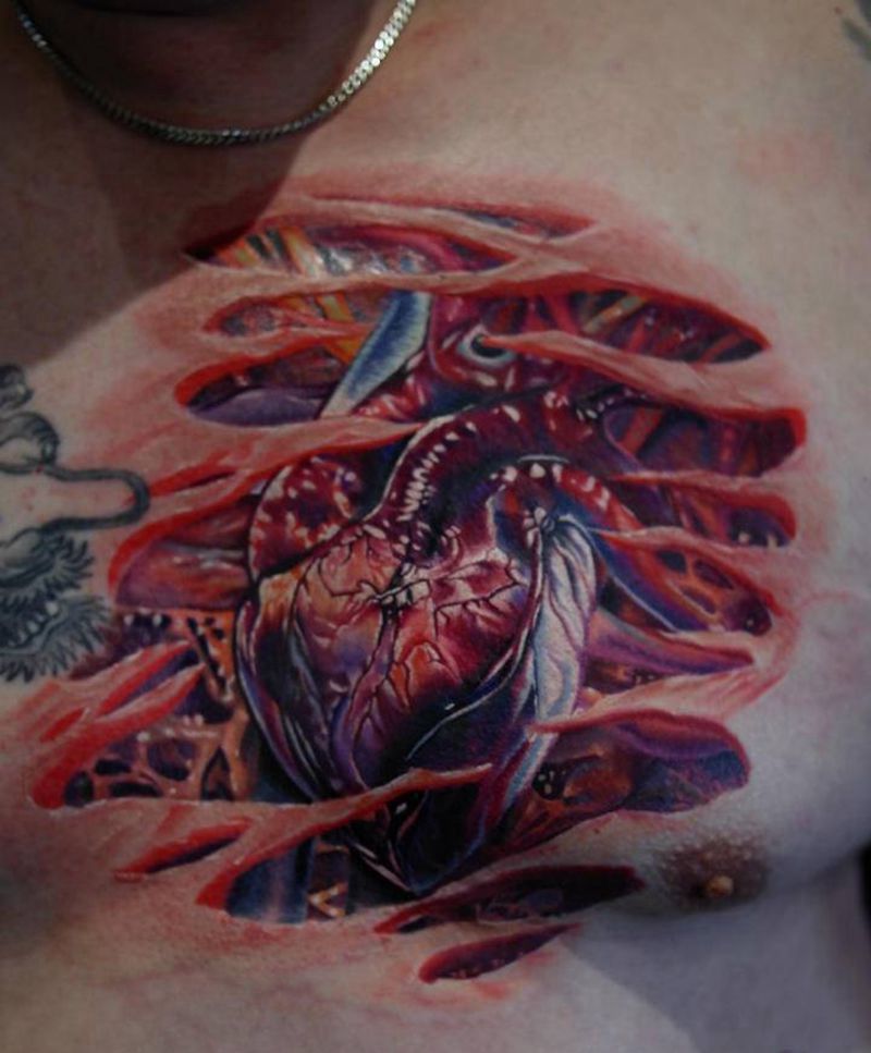 胸口 心脏纹身图片_胸部欧美写实心脏纹身图案